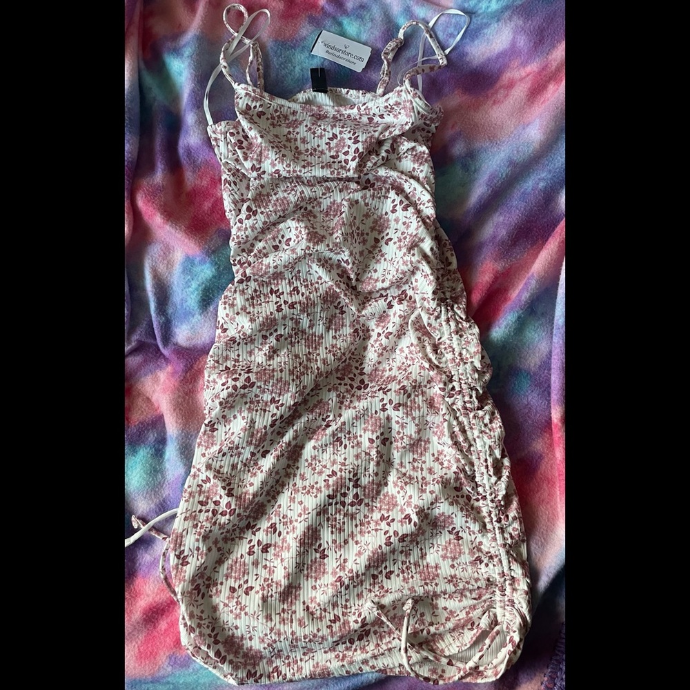 Windsor day dress has ruffle on the side red and pink flowers and leaves!